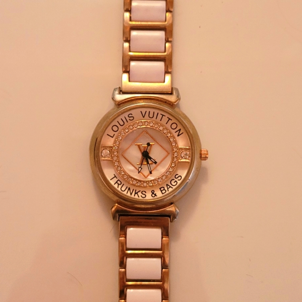 White and gold watch